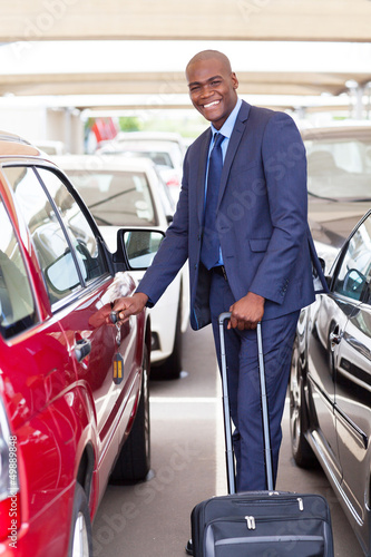 handsome african businessman in airport parking lot © michaeljung