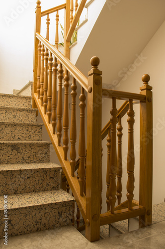 wooden railing  installed in a Staircase