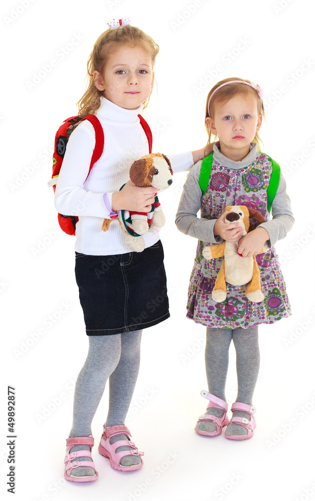 girls sisters with toys