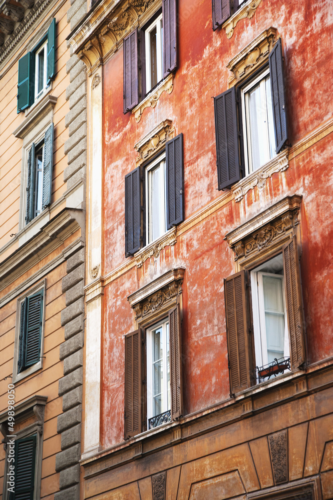 Low angle view of windows of a house, Rome, Lazio, Italy