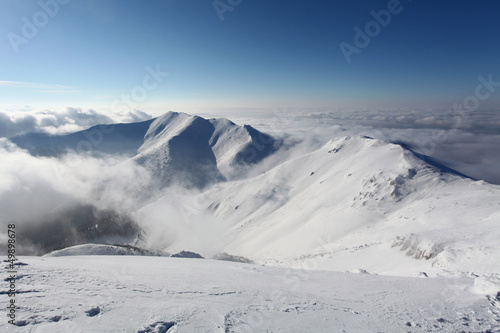 Winter mountain landscape with sun - Slovakia