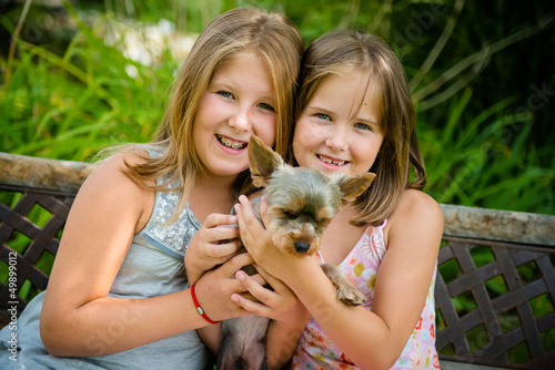 Happy children with their pet