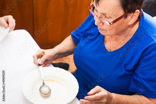 Senior woman eating