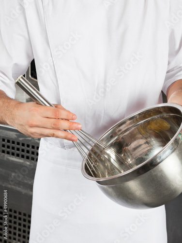 Chef With Wire Wisk And Mixing Bowl photo