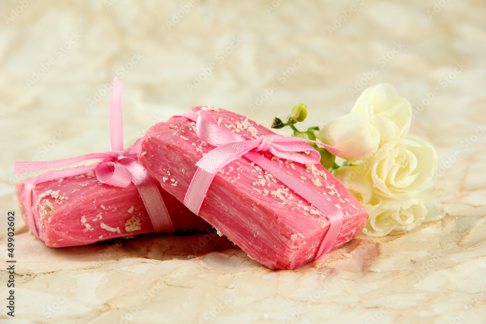 Natural handmade soap, on beige background Natural handmade soap, on beige background