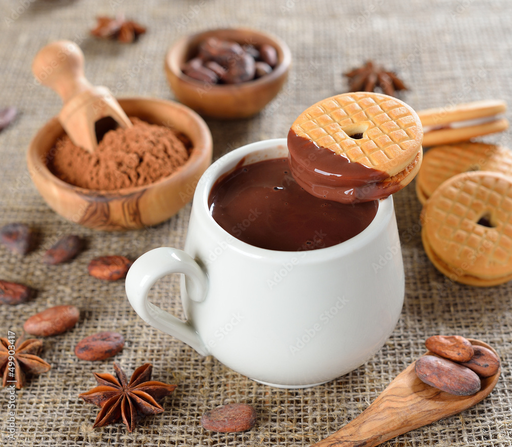 Cookies and hot chocolate on jute background Cookies and hot chocolate on jute background