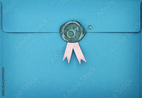 Blue envelope with male symbol on sealing wax stamp © viperagp