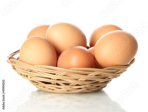 Wallpaper Mural Many eggs in basket isolated on white Torontodigital.ca