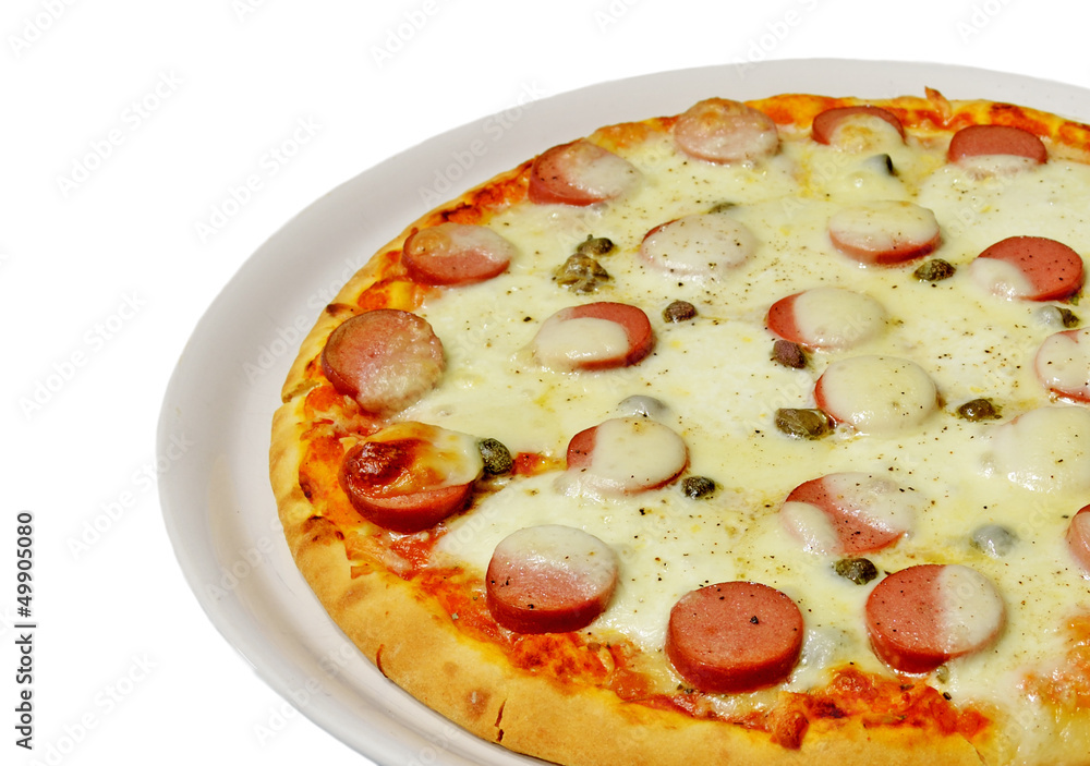 closeup of a pizza with sausages