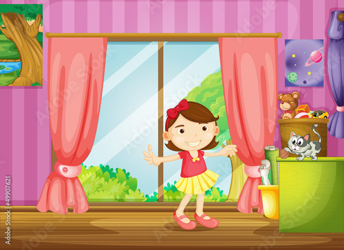 A girl and a cat inside the house