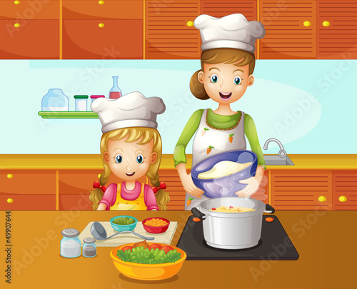 A mother and daughter cooking