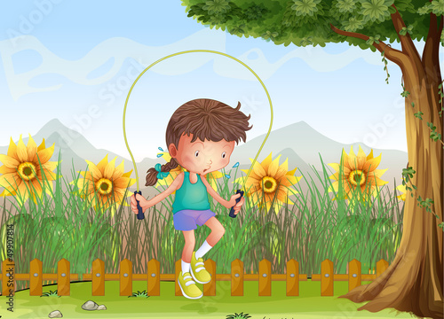 A girl playing jumping rope