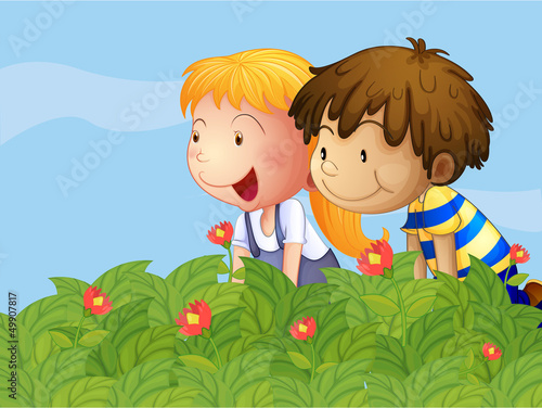 A boy and a girl in the garden