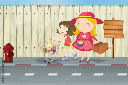 A mother and child near the empty signboard
