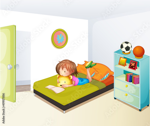 A girl studying in her clean bedroom