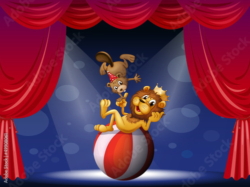 A lion and a beaver performing at the stage