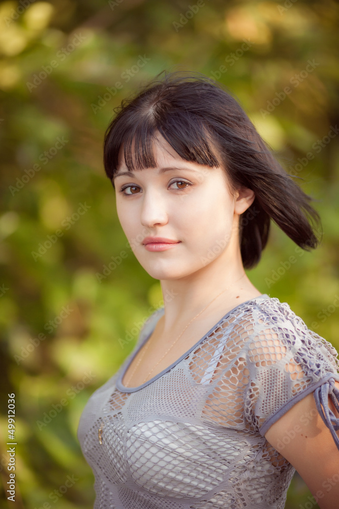 Naklejka premium beautiful girl in a forest