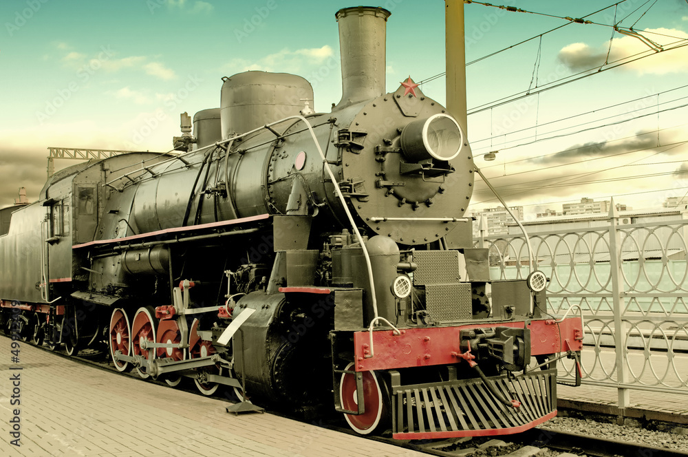 Old steam locomotive at station Old steam locomotive at station