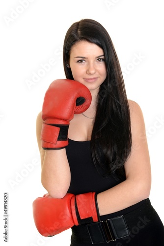 Young beautiful woman with boxing gloves photo