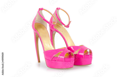Pink stylish shoes isolated on white