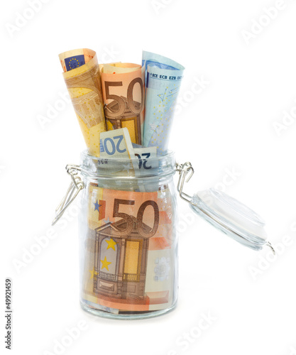 Banknotes in opened jar