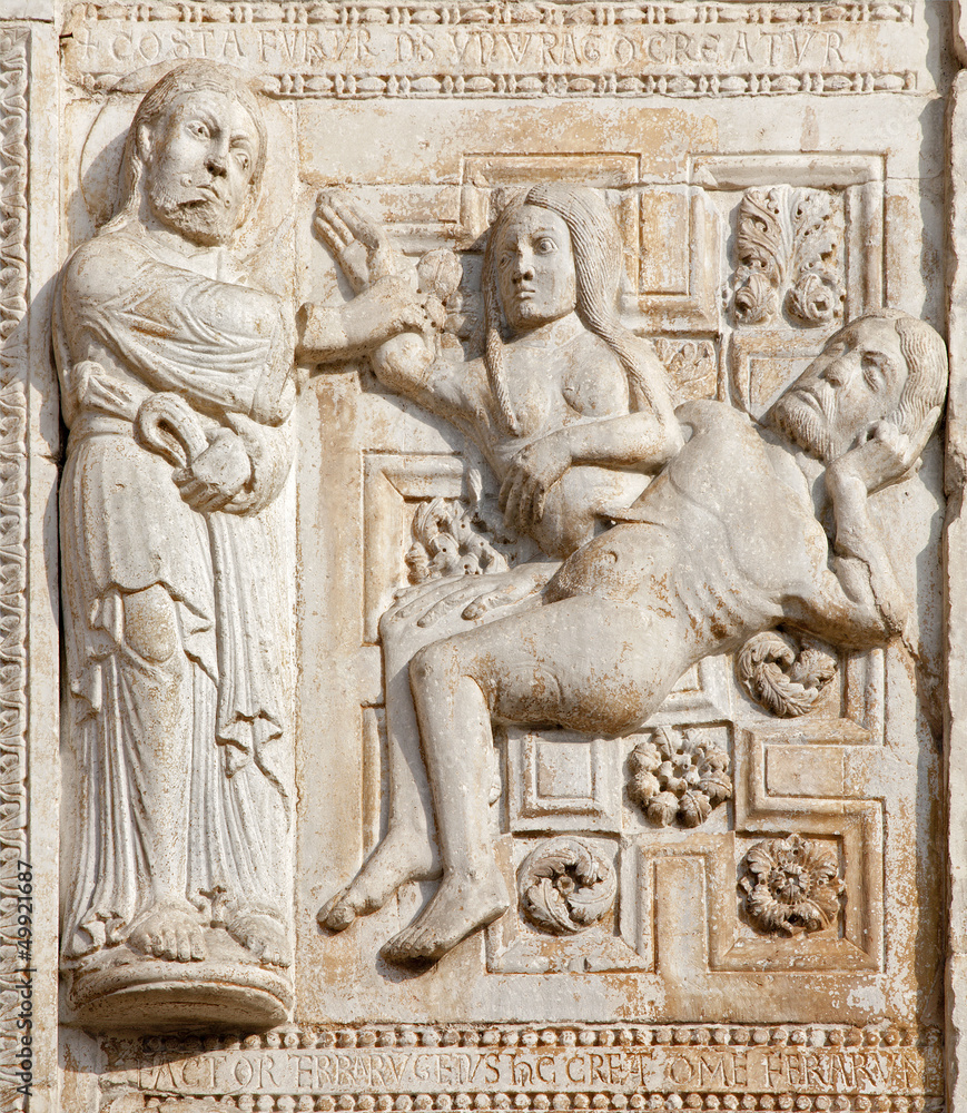 Verona - Relief of creation of woman on San Zeno church