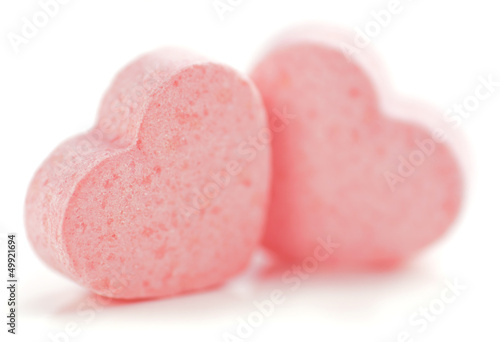 Sweet hearts shaped pink Sugar Pills. Soft Focus.