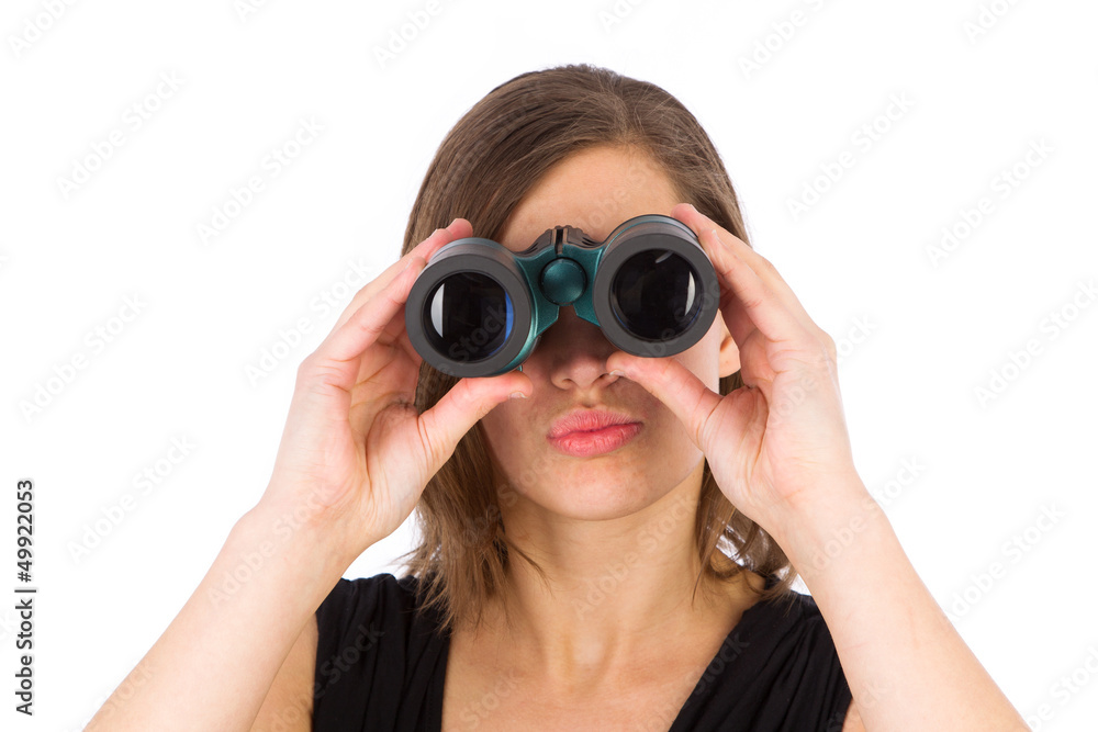 Attractive woman using binoculars Attractive woman using binoculars