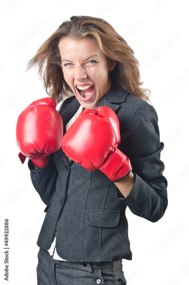Young businesswoman in boxing concept Young businesswoman in boxing concept