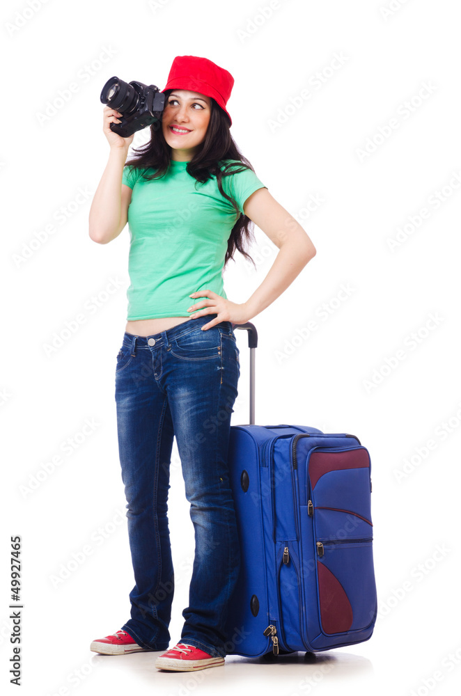 Young girl with travel case and camera
