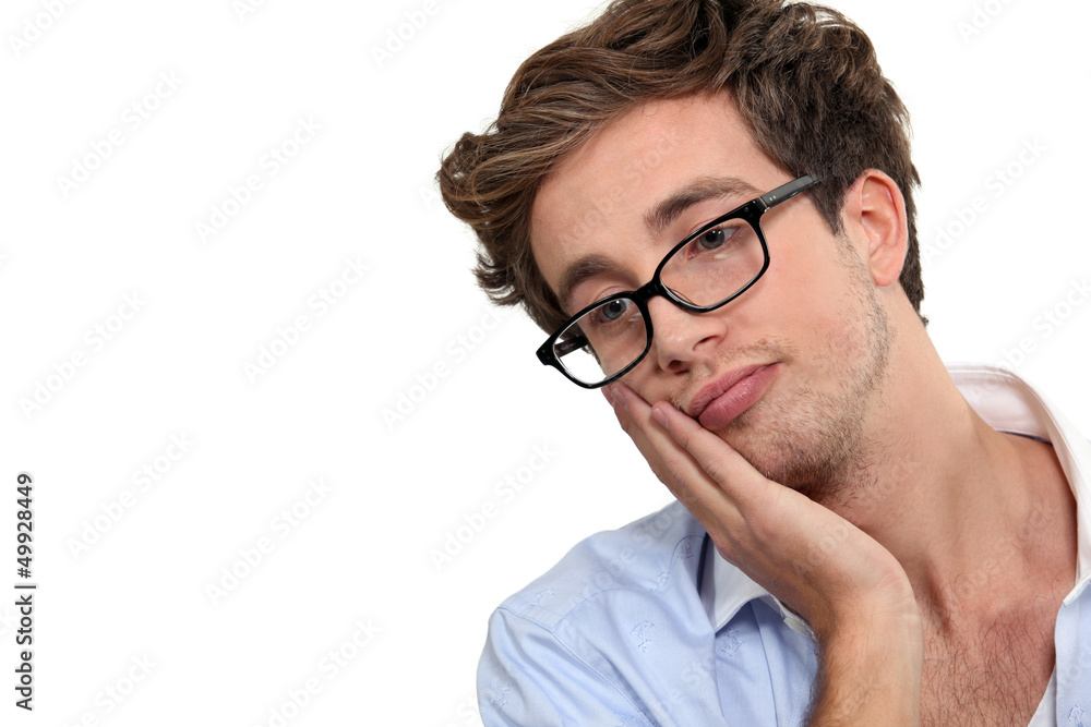 A bored young man. A bored young man.