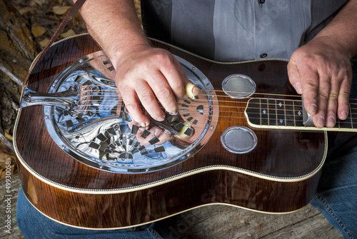 Classic Dobro guitar played my a master photo