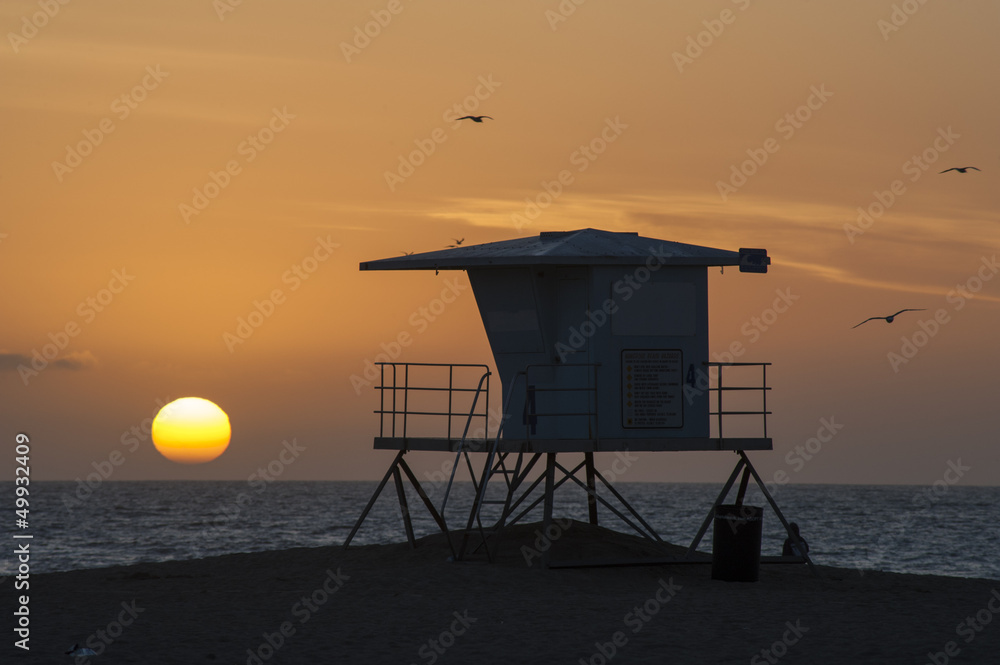 lifeguard tower sunset