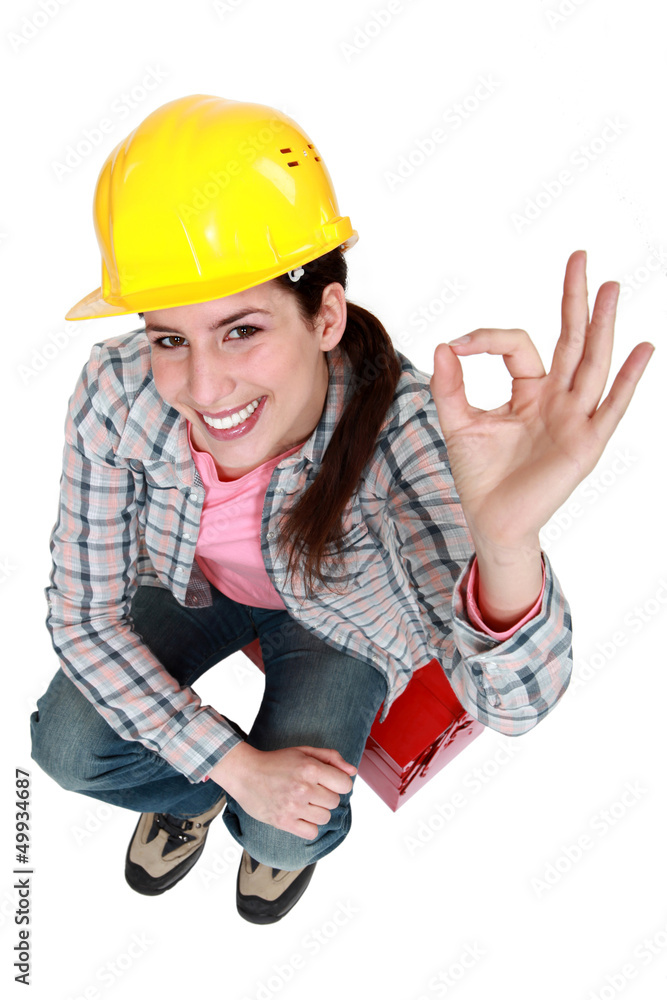 Tradeswoman giving the a-ok sign Tradeswoman giving the a-ok sign