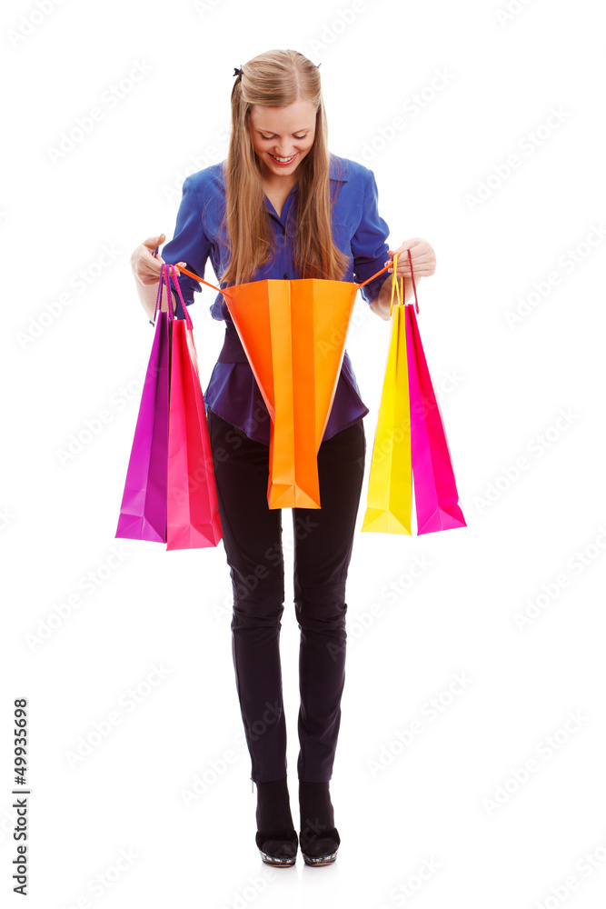 woman looking to shopping bag