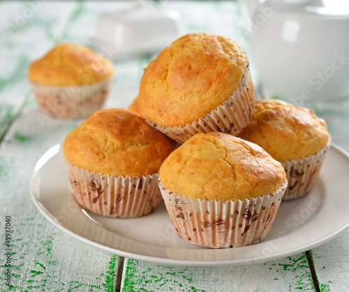 Corn muffins on a white table