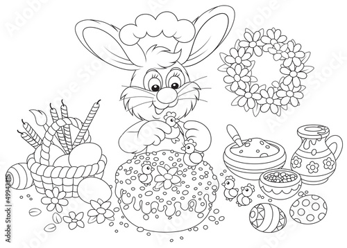 Rabbit decorating an Easter cake