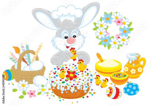 Easter bunny decorates a fa...