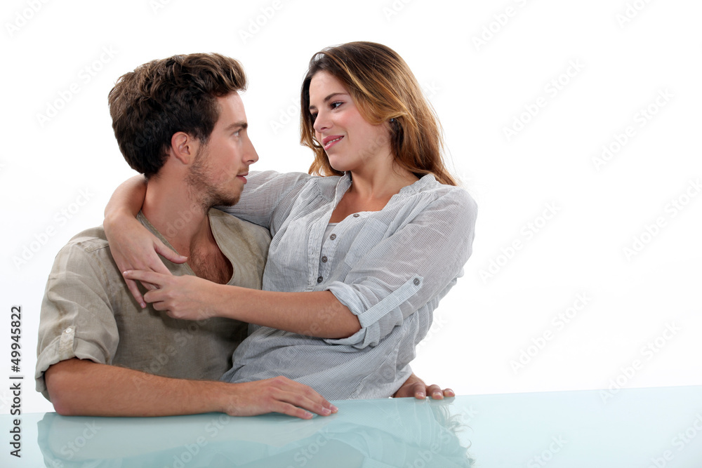 Woman sitting in the lap of her boyfriend Woman sitting in the lap of her boyfriend