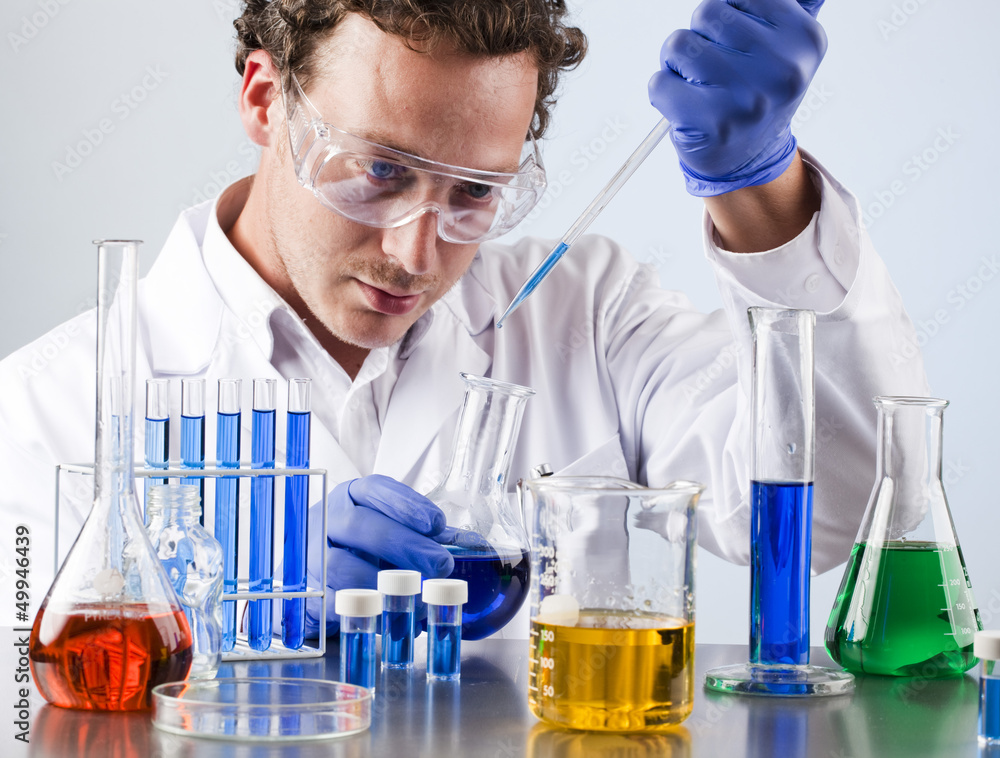 Fototapeta premium student in science analysing chemical solutions