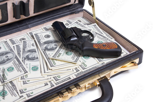 case with money and gun