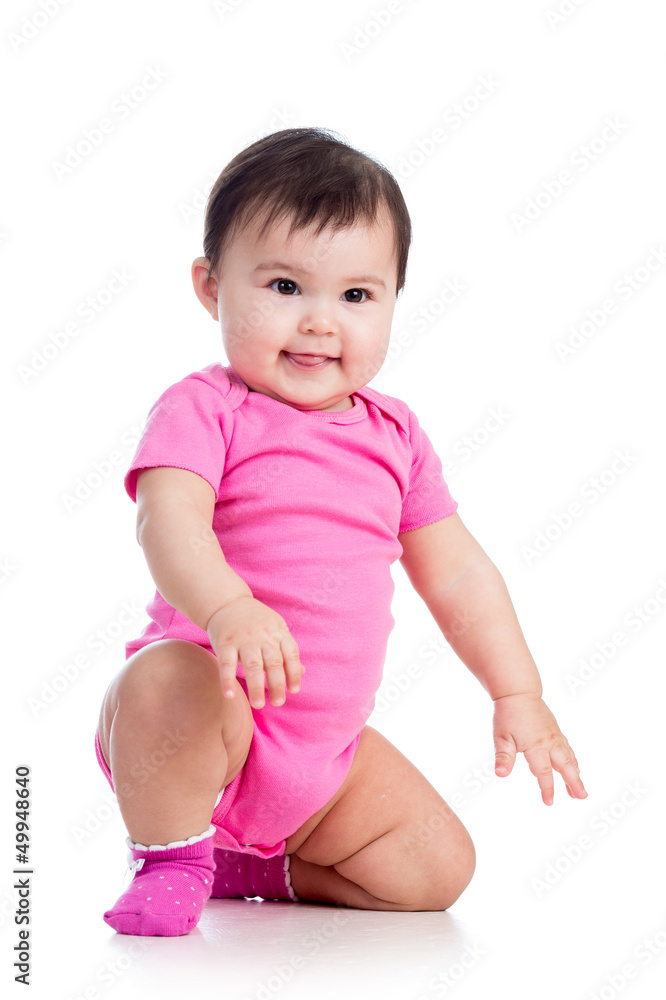 playful baby girl in studio on white background playful baby girl in studio on white background