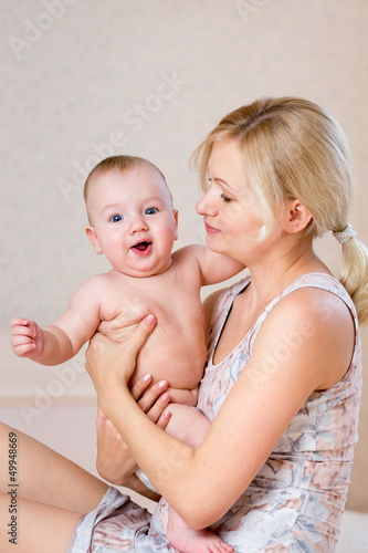 mother with baby boy indoors