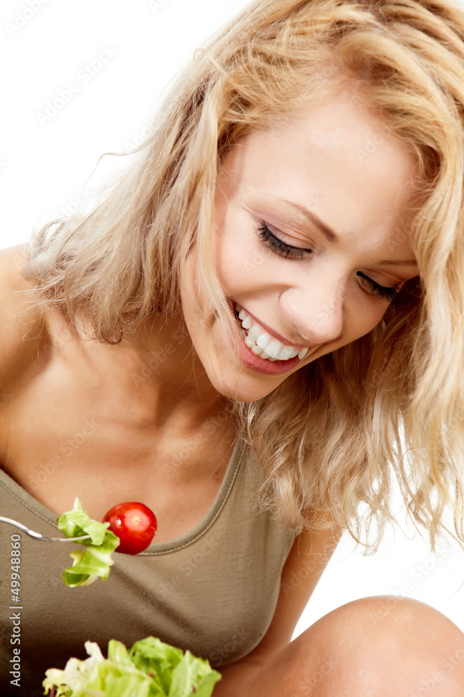 The young beautiful woman with the fresh vegetables The young beautiful woman with the fresh vegetables