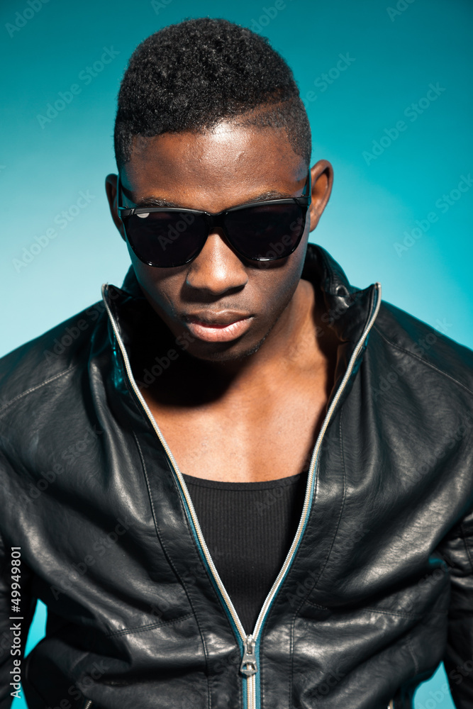Fototapeta premium Cool urban stylish black american man. Fashion studio shot.