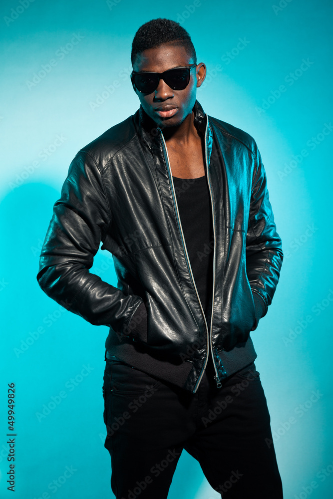 Fototapeta premium Cool urban stylish black american man. Fashion studio shot.