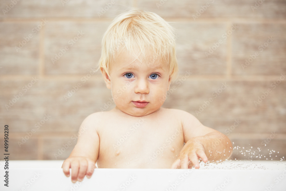 Blond baby in the bathroom Blond baby in the bathroom