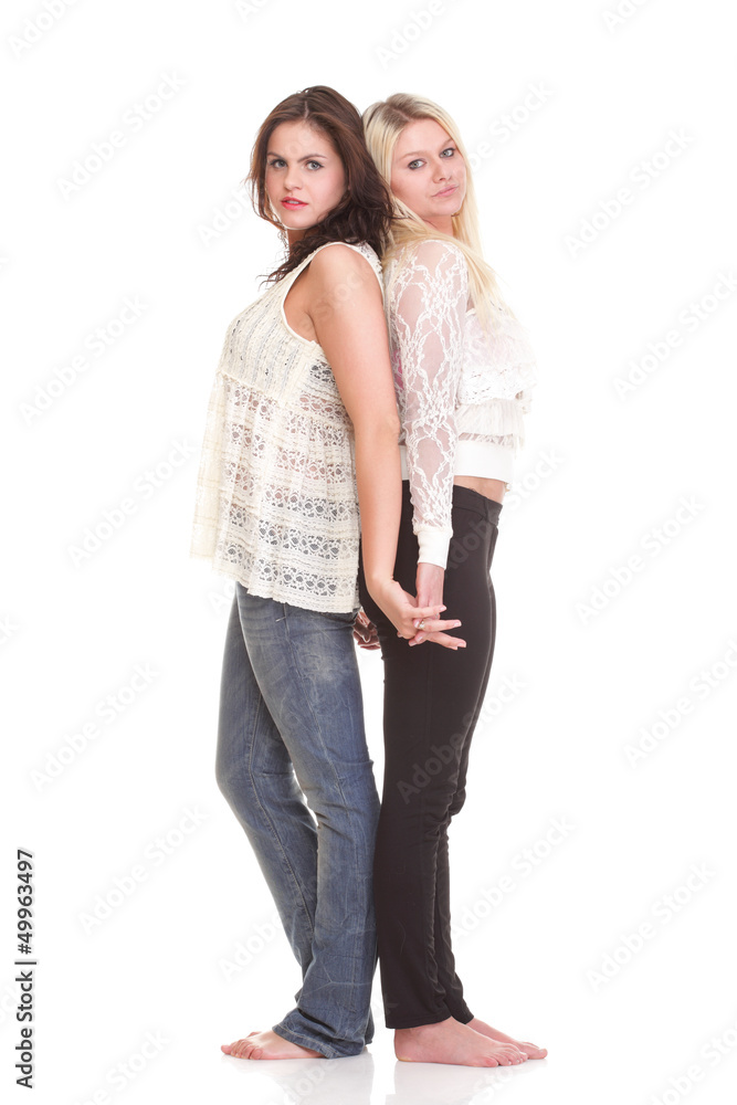 Full length portrait of a two pretty young women posing Full length portrait of a two pretty young women posing
