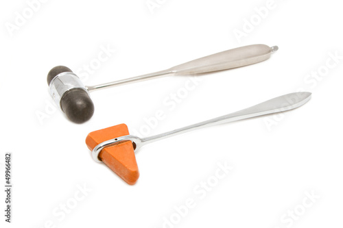 Knee-jerk hammer on white background photo