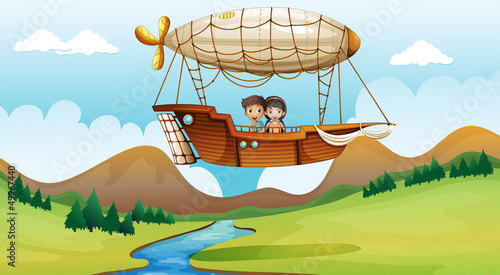 A girl and a boy inside the aircraft